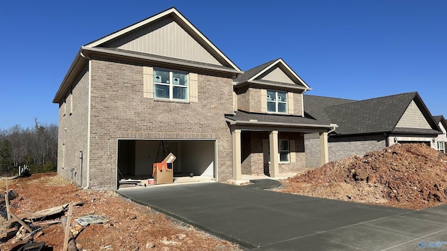 craftsman house with a garage