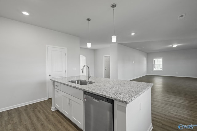 kitchen featuring sink, white cabinetry, hanging light fixtures, dishwasher, and a kitchen island with sink