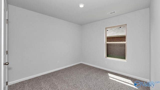 view of carpeted spare room