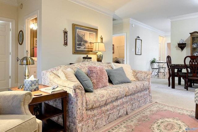 living room with crown molding, carpet floors, and washer / dryer