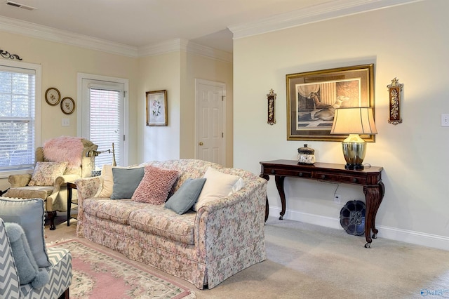 living room with a healthy amount of sunlight, crown molding, and light colored carpet