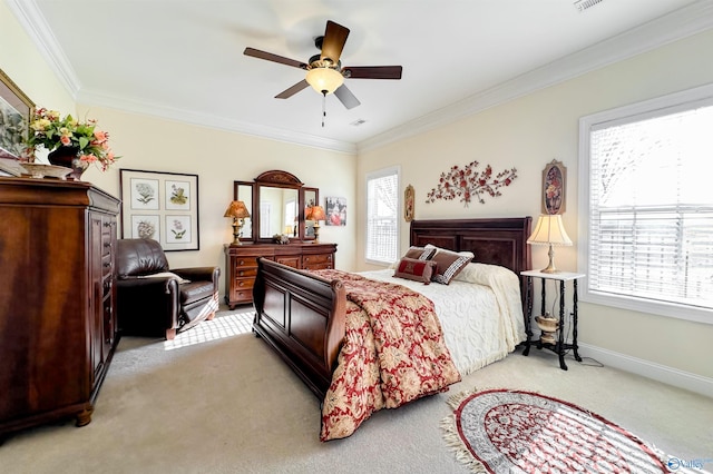 bedroom featuring light colored carpet, ceiling fan, and crown molding