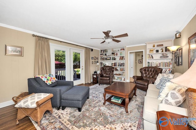 living room with ornamental molding, ceiling fan, and hardwood / wood-style floors