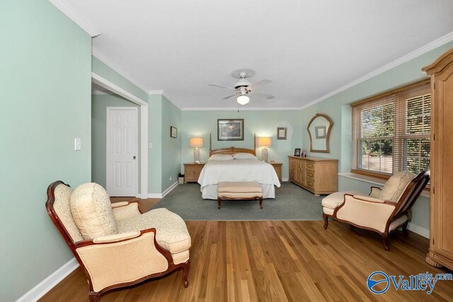 3318 Ohara Rd SW, Huntsville, AL 35801 - bedroom with wood finished floors, a ceiling fan, ornamental molding, and baseboards