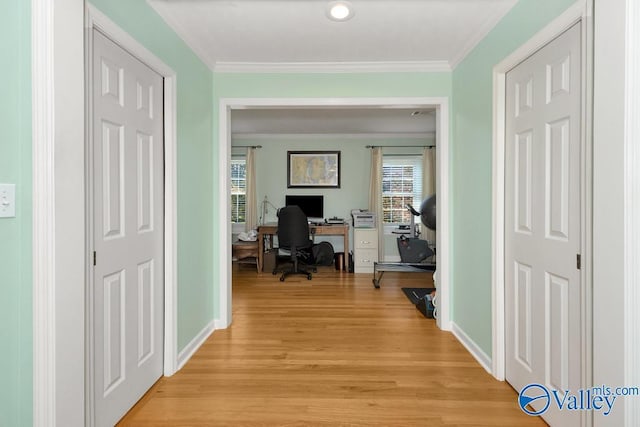 3318 Ohara Rd SW, Huntsville, AL 35801 - office area featuring crown molding, light wood finished floors, and baseboards