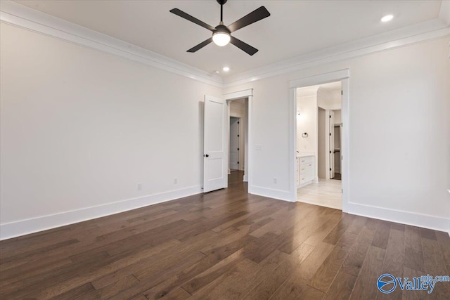 unfurnished bedroom featuring ceiling fan, hardwood / wood-style flooring, connected bathroom, and ornamental molding