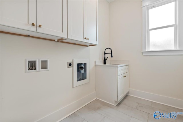 laundry room featuring hookup for a washing machine, sink, cabinets, electric dryer hookup, and light tile patterned flooring