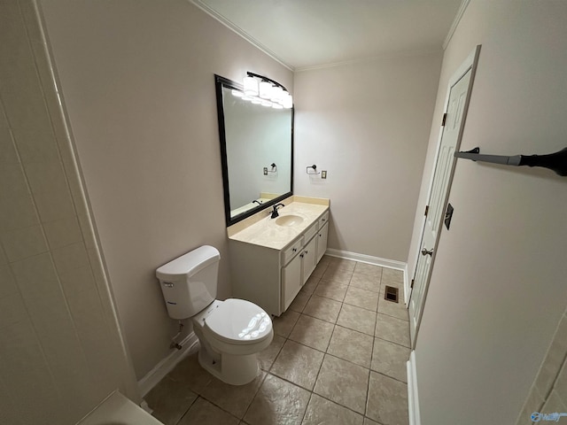 bathroom with toilet, visible vents, vanity, ornamental molding, and tile patterned floors