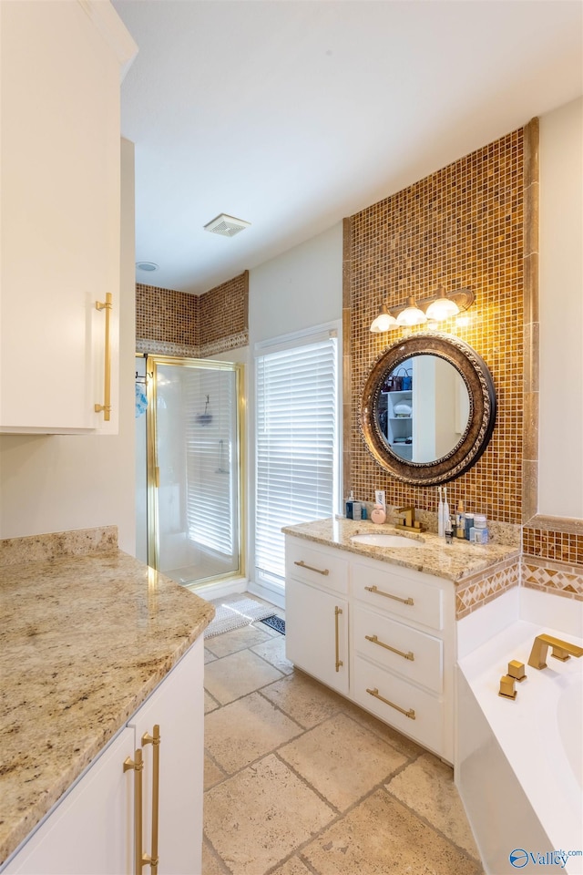 bathroom with plus walk in shower and vanity