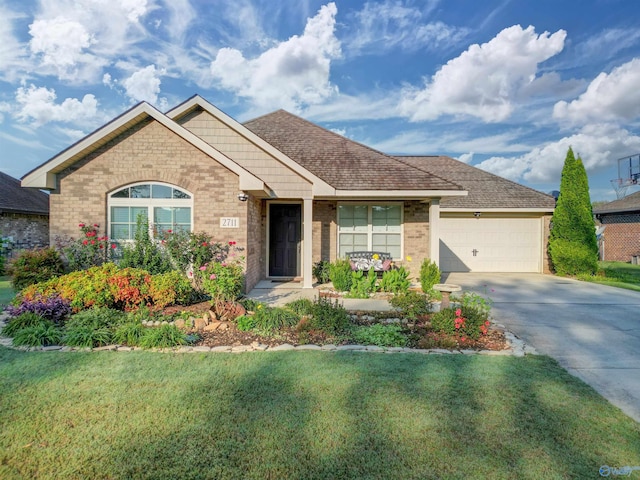 ranch-style home with brick siding, driveway, a garage, and a front lawn