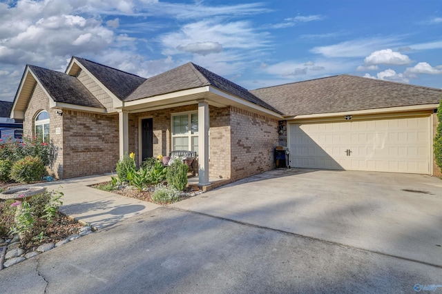 ranch-style house with a garage and a porch