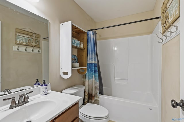 bathroom featuring shower / tub combo, vanity, and toilet