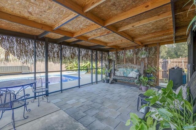 view of patio featuring a fenced in pool and fence