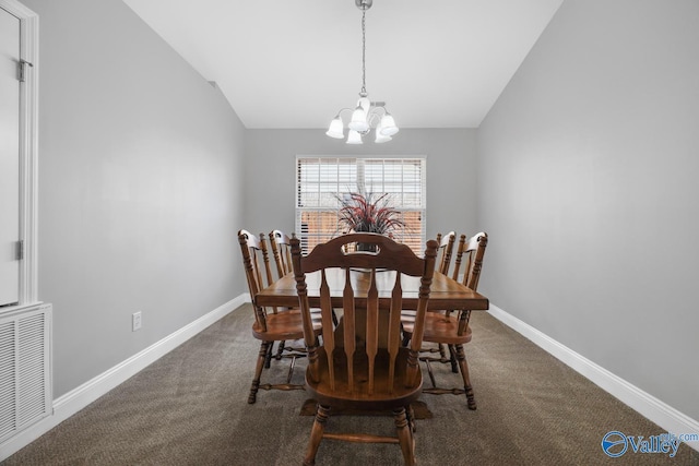 carpeted dining room with an inviting chandelier and vaulted ceiling