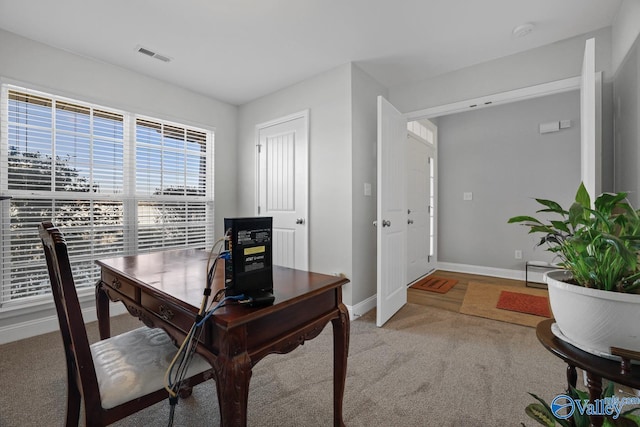 view of carpeted home office