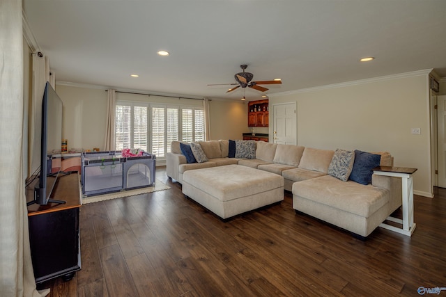living area with a ceiling fan, recessed lighting, dark wood-style flooring, and crown molding