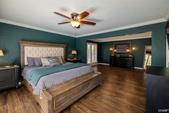 bedroom featuring ornamental molding, dark wood-style flooring, baseboards, and a ceiling fan