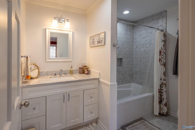 bathroom featuring shower / tub combo, ornamental molding, and vanity