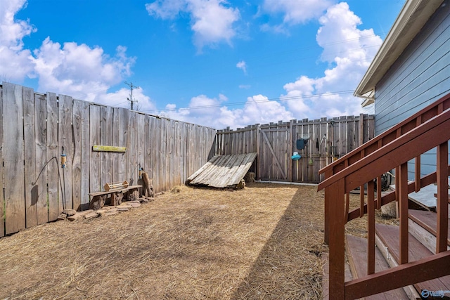 view of yard featuring a fenced backyard