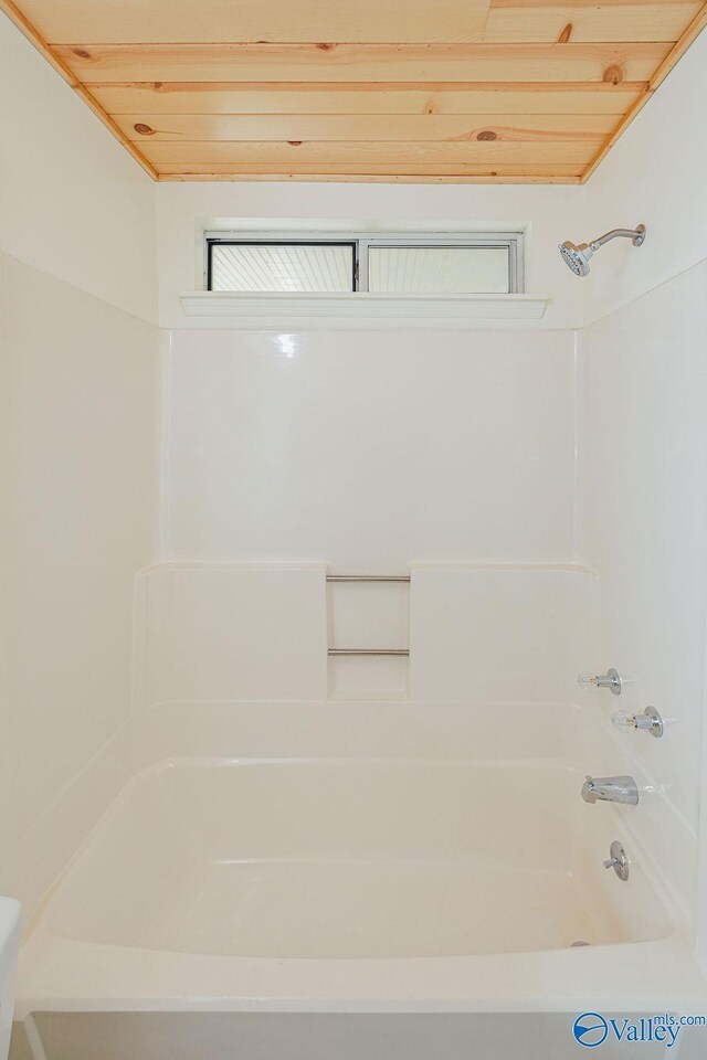 bathroom featuring wood ceiling and shower / washtub combination