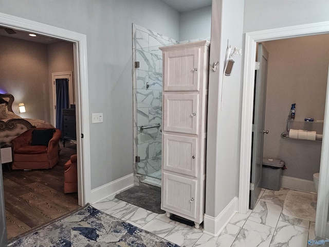 bathroom featuring an enclosed shower