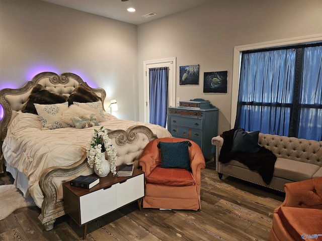 bedroom featuring dark wood-type flooring