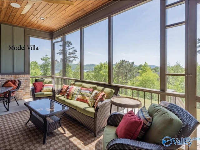 sunroom featuring wood ceiling