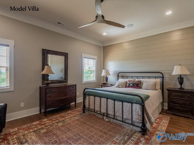 bedroom with ornamental molding, ceiling fan, and hardwood / wood-style floors