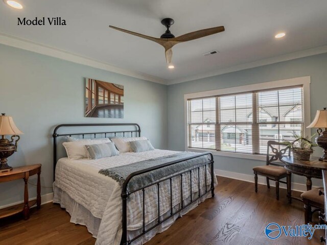 bedroom with crown molding, dark hardwood / wood-style floors, and multiple windows