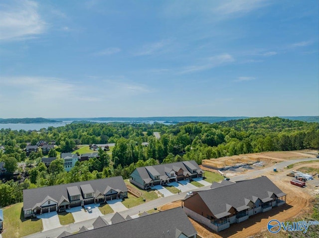 aerial view featuring a residential view and a view of trees