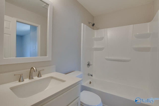 bathroom featuring shower / bathtub combination, toilet, and vanity