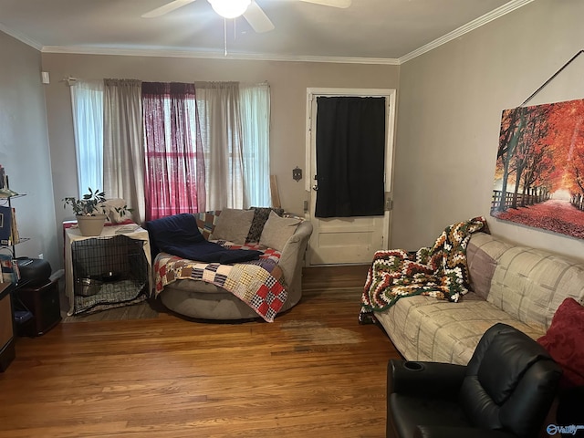 220 E Walnut St, Gadsden, AL 35903 - living room with wood finished floors, a ceiling fan, and ornamental molding