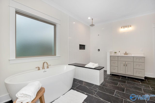 full bathroom with a walk in shower, a freestanding tub, ornamental molding, vanity, and marble finish flooring