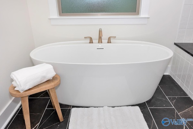 full bath with a soaking tub