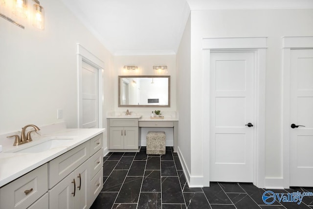bathroom with two vanities and ornamental molding