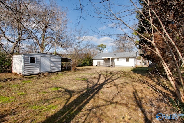 1608 Humes Ave, Huntsville, AL 35801 - view of yard featuring a storage shed and an outdoor structure