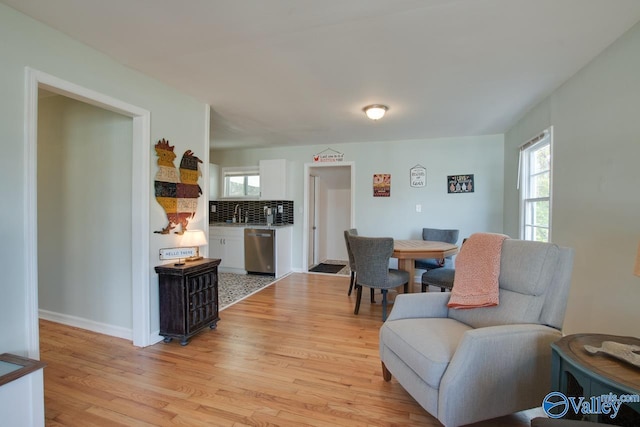 1608 Humes Ave, Huntsville, AL 35801 - dining area with light wood-style floors and baseboards