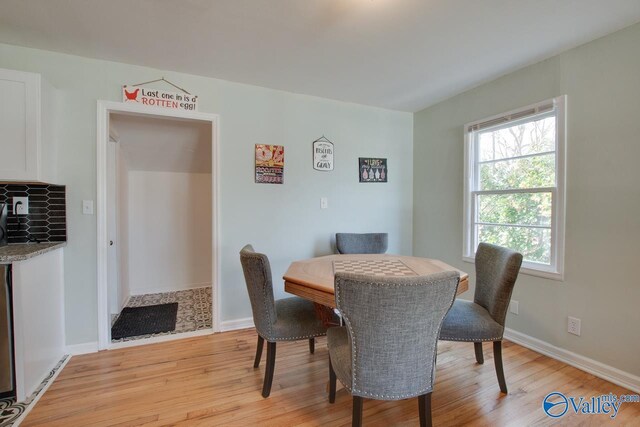 1608 Humes Ave, Huntsville, AL 35801 - dining area featuring baseboards and light wood-style flooring