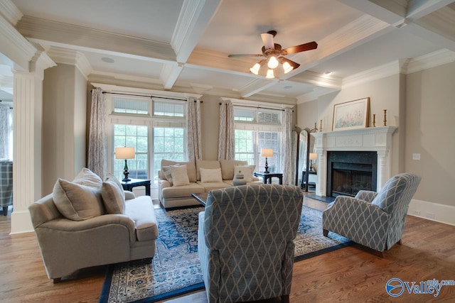 living room with coffered ceiling, decorative columns, ornamental molding, beamed ceiling, and hardwood / wood-style floors