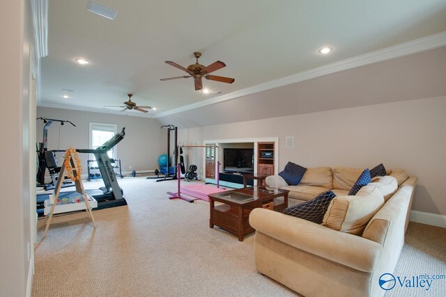 exercise room featuring ornamental molding, light carpet, and ceiling fan