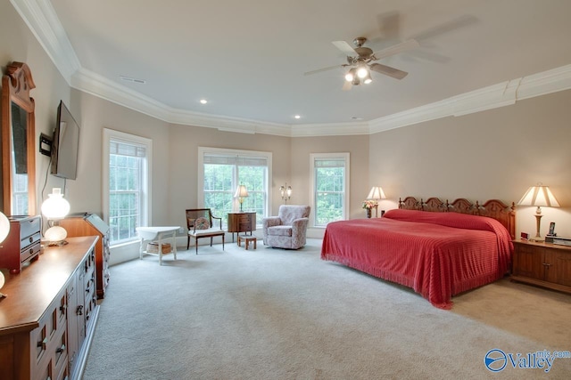 carpeted bedroom with crown molding and ceiling fan