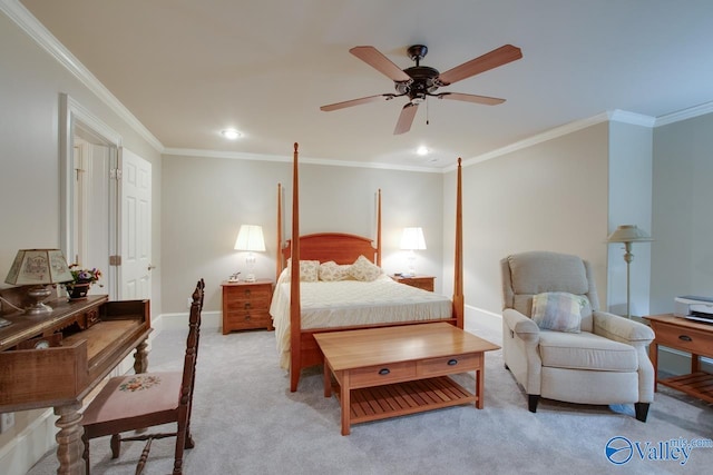 carpeted bedroom with ornamental molding and ceiling fan