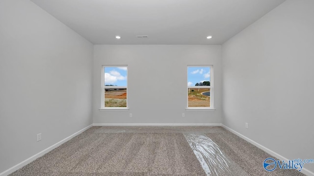 22392 Westminster Dr, Athens, AL 35613 - spare room featuring carpet, baseboards, and recessed lighting