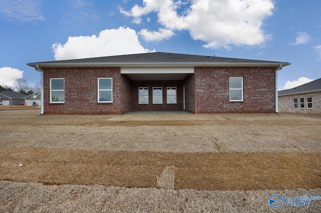 22392 Westminster Dr, Athens, AL 35613 - rear view of property with a patio and brick siding