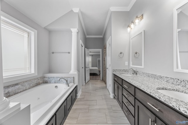 17067 Stonegate Dr, Athens, AL 35613 - bathroom featuring a sink, a tub with jets, double vanity, and crown molding