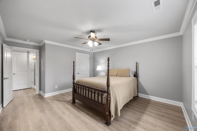 17067 Stonegate Dr, Athens, AL 35613 - bedroom featuring light wood finished floors, visible vents, a ceiling fan, crown molding, and baseboards