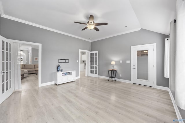 17067 Stonegate Dr, Athens, AL 35613 - unfurnished living room with baseboards, a ceiling fan, french doors, and light wood finished floors