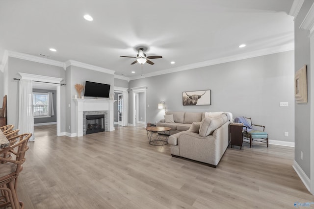 17067 Stonegate Dr, Athens, AL 35613 - living room with recessed lighting, a fireplace, a ceiling fan, and baseboards