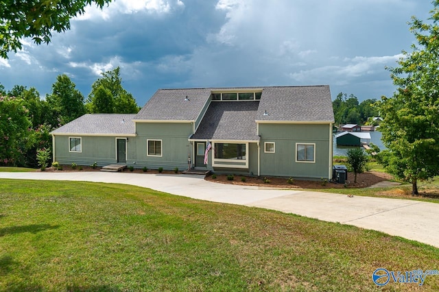 view of property featuring a front yard