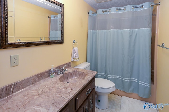bathroom featuring tile patterned floors, toilet, a textured ceiling, shower / tub combo, and vanity